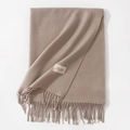 Solid earth brown cashmere-like scarf with fringe and woven label on white background - 70*200cm / Oatmeal
