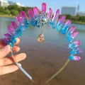 Detail of crystal crown featuring pink and blue quartz stones with a sun pendant charm - Sea Blue/Sun/AB Colorful Pendant