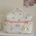 Quilted makeup bag with pink bow pattern and dual zipper closure for travel - Large Cosmetic Bag / Pink