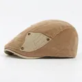 Retro khaki corduroy beret flat cap for women and men featuring metal rivet details - Adjustable / Khaki