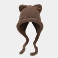 Close-up of knit cat ear hat featuring thick mixed-color yarn and braided earflaps - Dark Brown