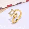 Detailed close-up of a gold-plated cat and fishbone ring with zircon stones - Cat and Fishbone-ZYN-DMR80G