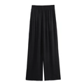 Vue détaillée du pantalon noir large à taille haute élastique et tissu soyeux fluide - XS / Noir