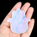 Opal Hamsa Hand stone carving with evil eye motif showing milky blue iridescent sheen - Opalite (Synthetic)