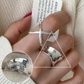 Elegant Korean style silver cross and irregular wave open rings for women on hand - Cross/Wavy Surface