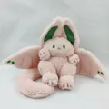 Cute pink plush bunny with bat wings and green eyes, fantasy stuffed animal toy - Pink Rabbit