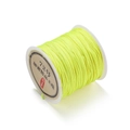 Macro detail of high-quality 0.8mm fluorescent yellow braided cord for DIY jewelry crafts - Yellow