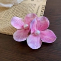 Pink lily flower hair claw clips with central pearl detail on a rustic wood surface - Purple White Gradient Flower Duckbill Clip (139#)