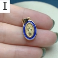Macro view of a gold-rimmed blue enamel Jesus pendant with detailed religious relief - Light Blue