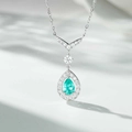 Macro view of S925 silver necklace with teardrop blue gemstone and sparkling white zircons - 925 Silver / Cyan Blue Zirconia-XL420