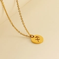 Gold plated stainless steel Sagittarius zodiac necklace with a circular cutout pendant - Sagittarius
