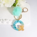 Blue resin letter Q keychain with mint green pompom and gold flakes for handbags - Letter Q