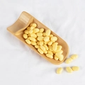 Artificial yellow soybeans in bamboo scoop on white fabric, realistic food model for decor - Soybeans (500g)