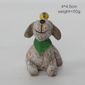Miniature resin brown dog figurine with green scarf and tiny bird on head, size 4x4.5cm - Dog with Ball