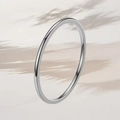 Minimalist silver-tone titanium steel slim ring with a polished metallic finish - US 5 / Polished Steel (1mm)