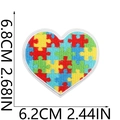 Macro detail of heart-shaped autism awareness puzzle patch with 6.8cm height dimensions - Puzzle Heart Bordered Style (No. 4)