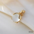 Macro shot of gold Ruyi lock pendant with moonstone and sparkling cubic zirconia detail - D032 White Moonstone