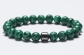 Green malachite beaded bracelet for men featuring a black hematite cylinder charm - Green Peacock Stone