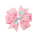 Detailed view of pink bat-themed hair clip with potion bottle and skull print pattern - 11-Pink Turquoise Potion Bottle