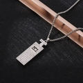 Detailed macro shot of silver perfume bottle pendant with sparkling crystals and No1 PARFUM text - XL04 / Perfume Bottle / Silver
