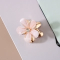 Detail of pink resin flower hair claw clip with glitter finish and center crystal accent - Crystal Glitter Style / Light Pink