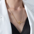 Collana elegante in acciaio al titanio dorato con pendente battito cardiaco e cuore - 48+5cm / Oro