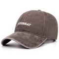 Detailed close-up of a vintage washed cotton baseball cap with white COVENRAT embroidery - Coffee