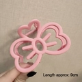 Pink matte hair claw clip with bow and heart cutout design, measuring 9cm in length - Matte Cat Pink-9cm