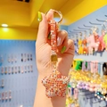 Sparkling orange star keychain with crystals and gold ring for handbag decoration - Mixed Red