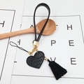 Porte-clés cœur en cuir noir avec pompon et accents dorés pour dragonne de téléphone portable - Noir