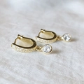 Elegant gold U-shaped hoop earrings with pave cubic zirconia and large round stone charms - Gold