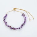 Detail of adjustable gold chain bracelet with purple amethyst stones and drawstring clasp - Purple