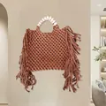 Handmade brown woven mini bag with long side tassels and round white wooden bead handle - Tan