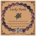 Pink Rhodonite beaded bracelet with silver turtle charm on a Lucky Turtle card - Rhodonite