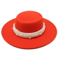 Detailed view of red wool felt boater hat featuring luxury faux pearl embellishments - M (56-58cm) / Orange Red