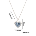 Detail view of heart pendant size 15mm by 15mm with blue gems on silver chain - Blue Rhinestone Heart Necklace Silver