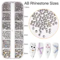 Set nail art 12 griglie con strass AB di varie dimensioni in scatola trasparente - Strass a Dorso Piatto AB Aurora Dimensioni Miste (12G-502)