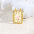 Macro view of gold rectangular enamel pendant with pink heart and zircon border - Pink Heart Style (ZYN-DMK877G-2)