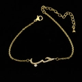 Gold Arabic script love necklace with pave set cubic zirconia crystals on black background - Bracelet - Gold