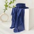 Elegant navy blue cotton linen scarf with tassel edges on minimalist white display - Royal Blue