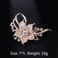Elegant rose gold flower brooch with white crystals and pearls in a floral cluster design - Rose Gold Rhinestone Flower Cluster Brooch (XD8450-2)