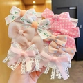 Variety set of kids bow hair ties with floral, polka dot, and lace fabric patterns - New Light Pink Style (0662-9)