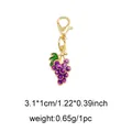 Grape pendant charm with purple enamel finish and golden lobster clasp for bags - Grapes