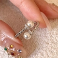 Silver twisted ring with double pearls and micro-pave crystals on the bands - Silver Double Pearl Twisted Ring
