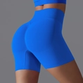 Seamless high-waisted yoga shorts in vibrant royal blue with scrunch butt lift texture - Bright Blue