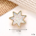 Detail view of a 2.7cm star-shaped shoe charm with golden edges and colorful sequins - C143 Glitter Hexagram