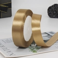 Roll of premium golden satin ribbon with metallic luster for luxury gift packaging - Champagne Gold