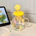 High-capacity glass straw cup with yellow flower lid and matching honey stirrer - Yellow