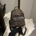 Mini leopard print backpack for women with gold hardware and adjustable straps - Brown