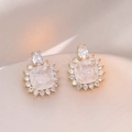 Gold earrings with square ice-cracked stone and zircon halo on champagne silk - Ice-Cracked Square Zirconia Style (E0784)